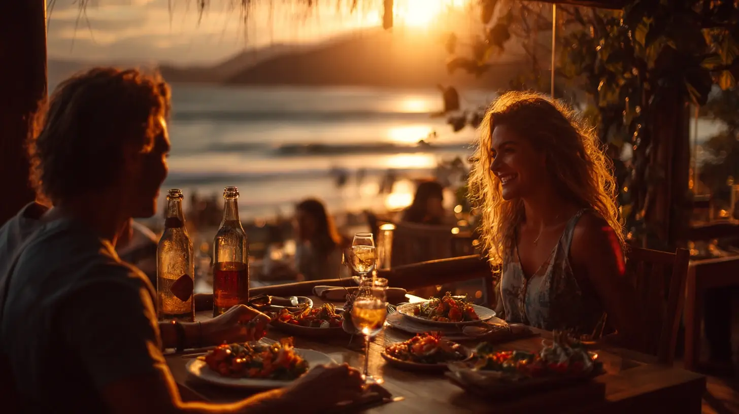 Couple enjoying seafood dinner and caipirinhas on a Brazilian beach at sunset.